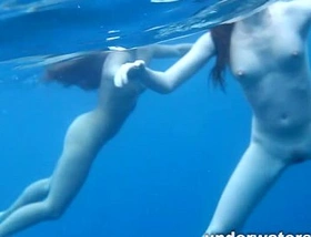 3 girls stripping in the sea