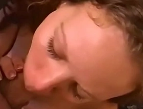 Curly hair amateur loves having her mouth fucked