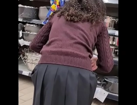 Spying teen girl at supermarket - short skirt
